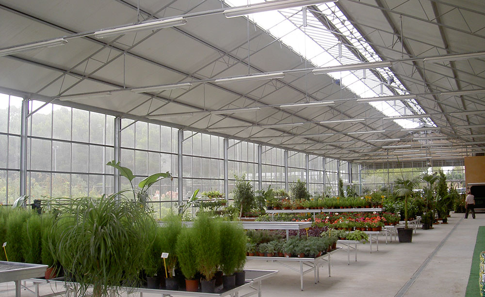 Interior view of garden center with PW wide-span greenhouse model